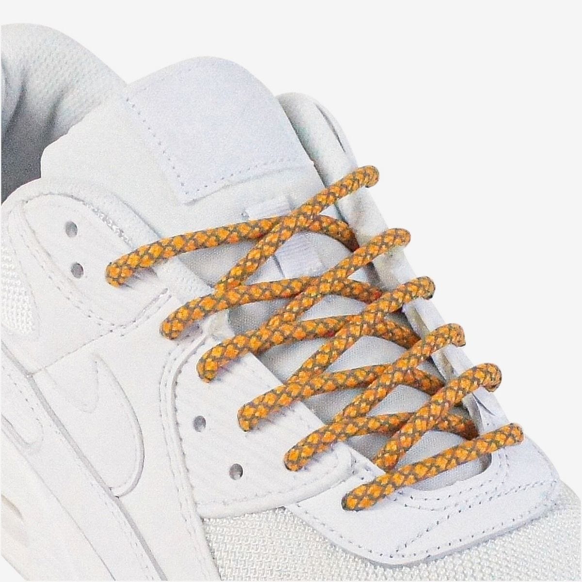 custom-color-shoelaces-on-white-sneakers-with-reflective-golden-orange-laces