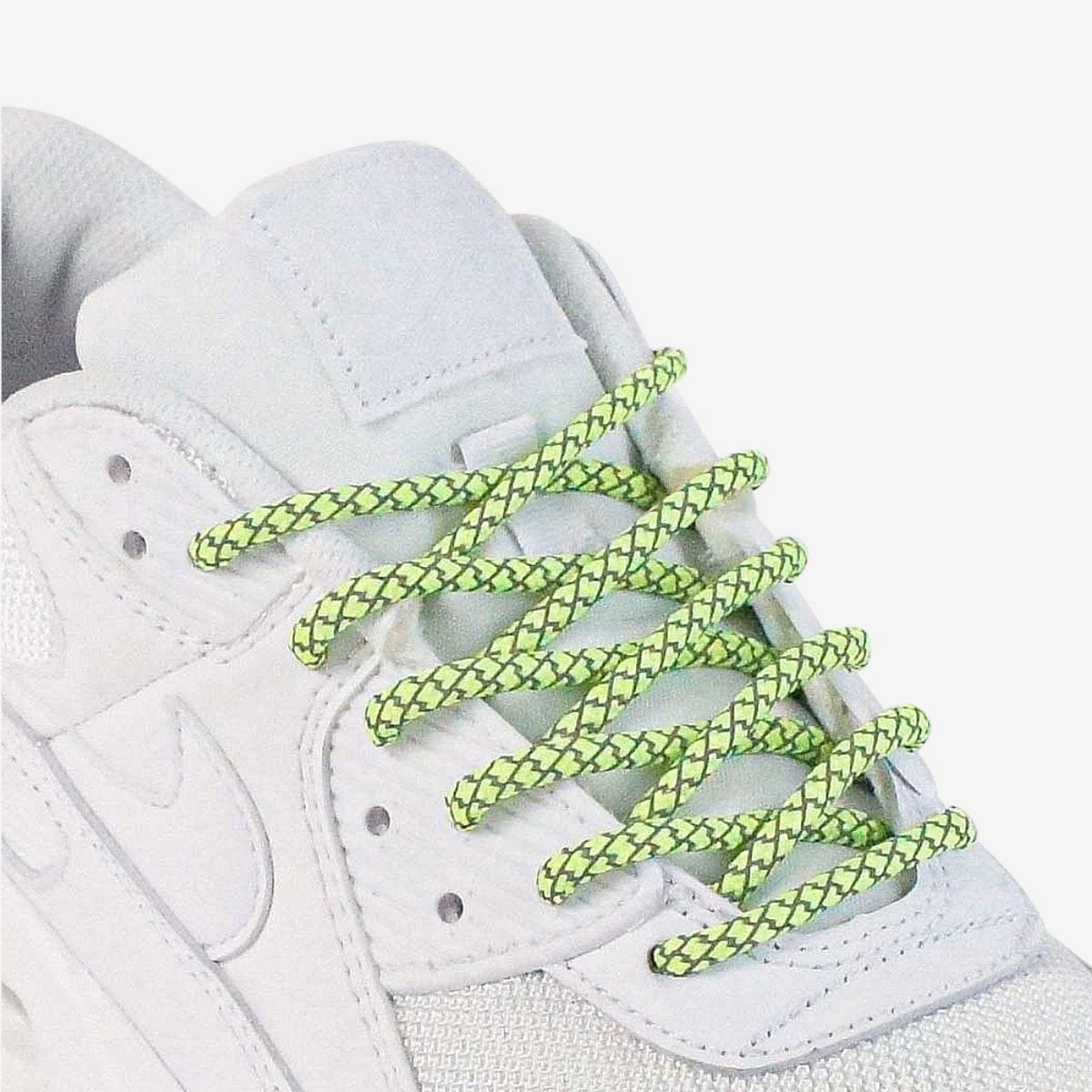 custom-color-shoelaces-on-white-sneakers-with-reflective-green-laces