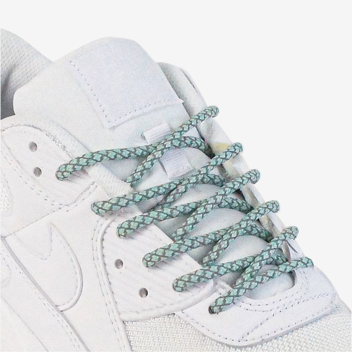 custom-color-shoelaces-on-white-sneakers-with-reflective-pastel-green-laces