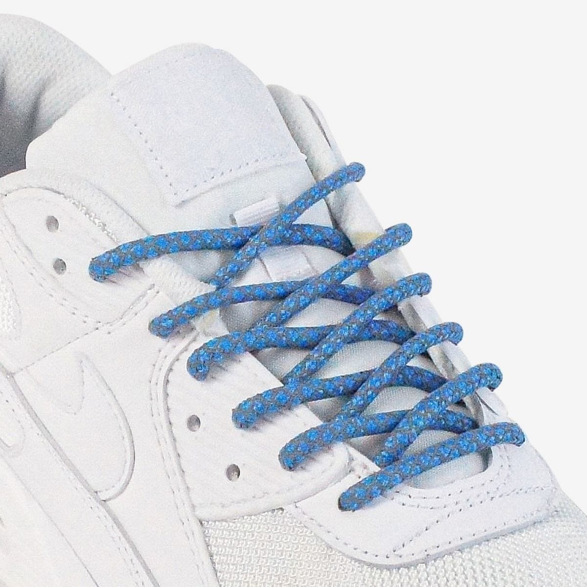 custom-color-shoelaces-on-white-sneakers-with-reflective-sky-blue-laces