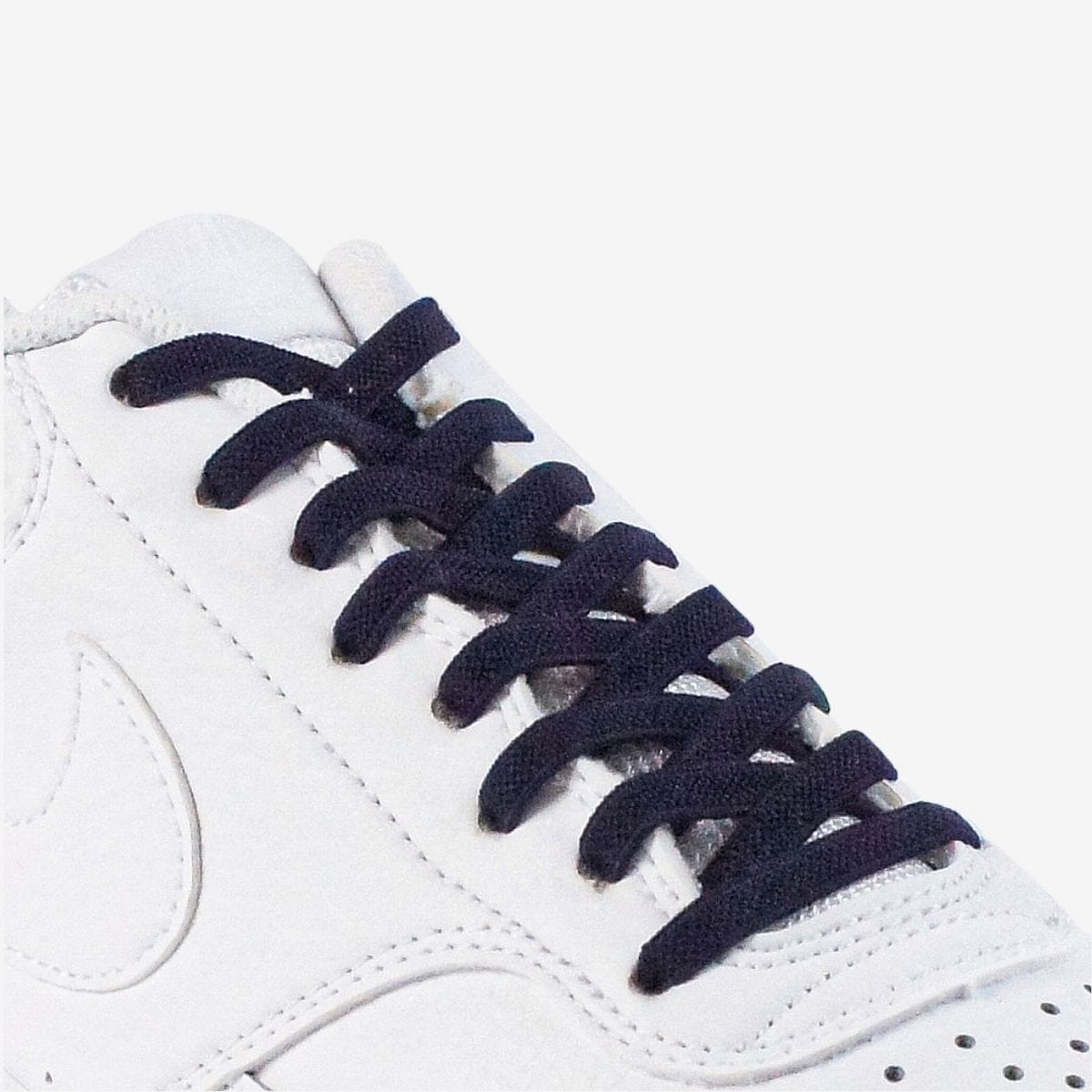 kids-no-tie-shoelaces-with-dark-blue-laces-on-nike-white-sneakers-by-kicks-shoelaces
