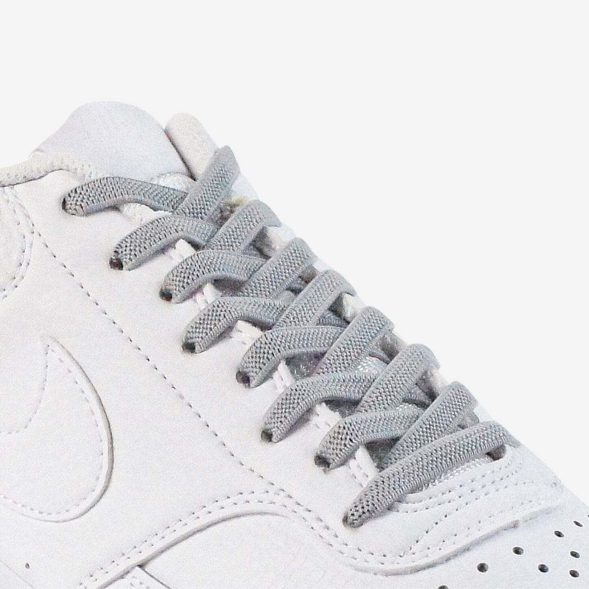 kids-no-tie-shoelaces-with-light-grey-laces-on-nike-white-sneakers-by-kicks-shoelaces