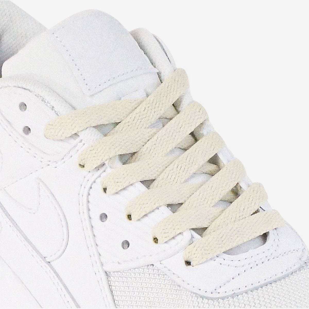 shoelace-patterns-on-womens-sneaker-using-beige-laces